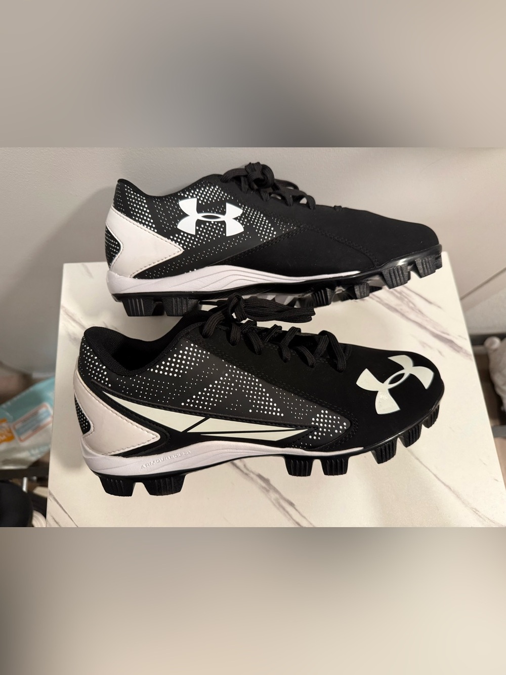 Under Armour Black and White Baseball Cleats with UA Logo